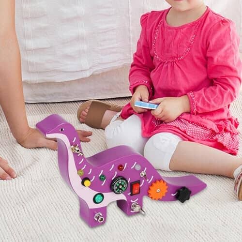 Tableau Montessori BusyBoard Brachiosaure | focus key  Jouet éducatif interactif pour bébé | Tableau Montessori BusyBoard Brachiosaure  Motricité et éveil sensoriel pour enfant | Tableau Montessori BusyBoard Brachiosaure